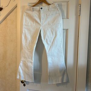 Frame Denim. flare at bottom beige and white striped jeans. Size 30 Crop